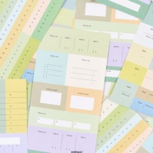 Analogue Keeper Beginning Sticker Set - an assortment of the different designs piled on top of each other