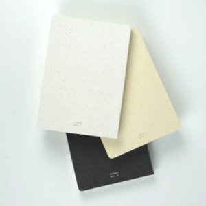 The Analogue Keeper A6 Logue Book in three colours (stone, desert, galaxy).